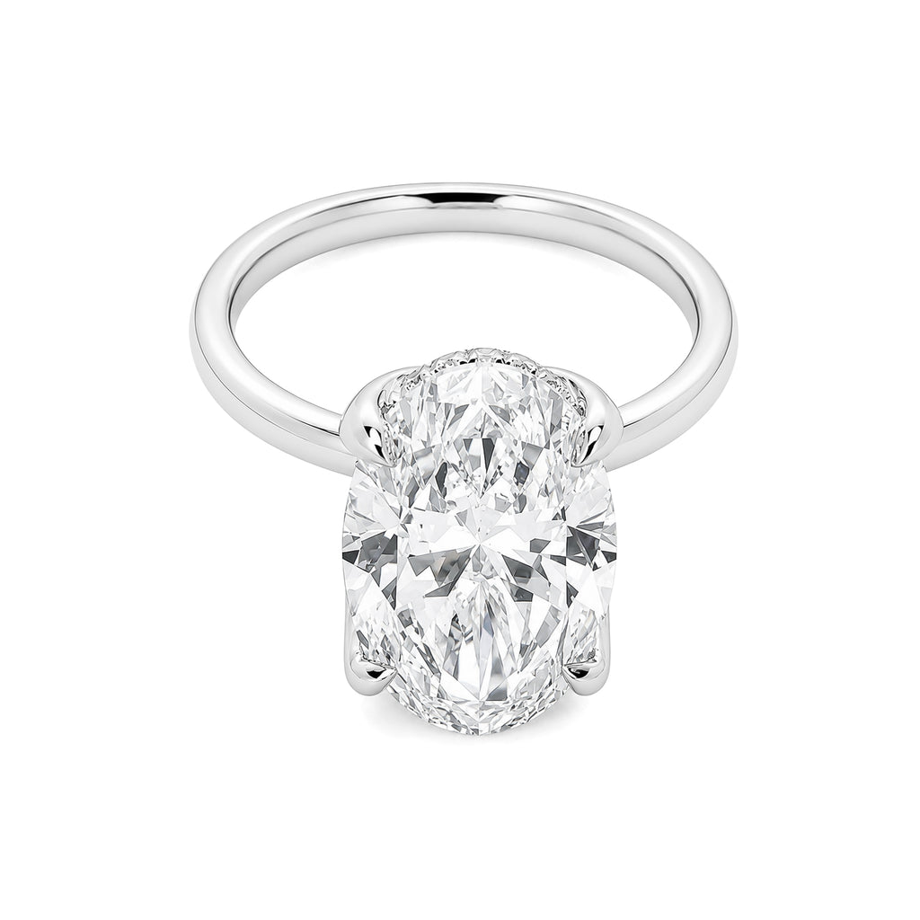 Luxury custom-made 3-carat oval-cut design set in platinum.